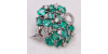 Bague en or blanc, sertie d'émeraudes et agrémentée de diamants