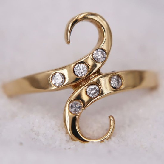 Bague en Or Jaune en forme de S ou de serpent ornée d'un diamant