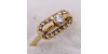 Bague en Or Jaune ornée de diamants avec un diamant central