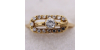 Bague en Or Jaune ornée de diamants avec un diamant central