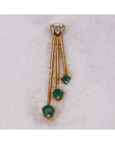 Pendentif en Or Jaune avec un diamant sublimé par trois émeraudes