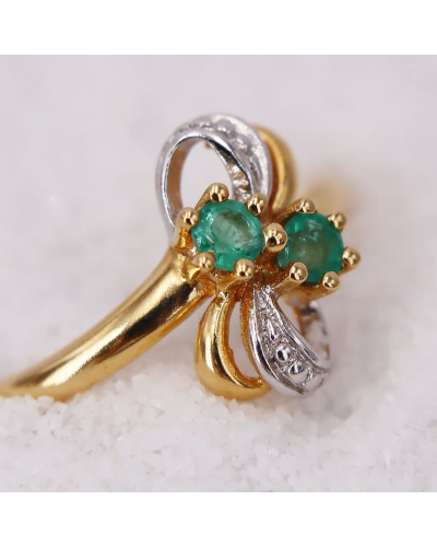 Bague en Or Jaune agrémentée de deux Émeraudes pour Femme