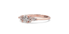 Bague Solitaire en or rose Accompagné de Diamants