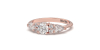 Bague Solitaire en or rose Accompagné de Diamants
