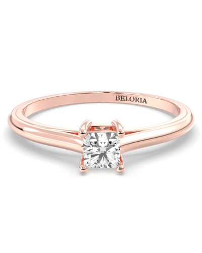 Bague solitaire en or rose avec diamant princesse