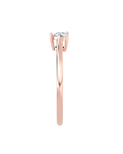 Bague solitaire en or rose avec diamant princesse