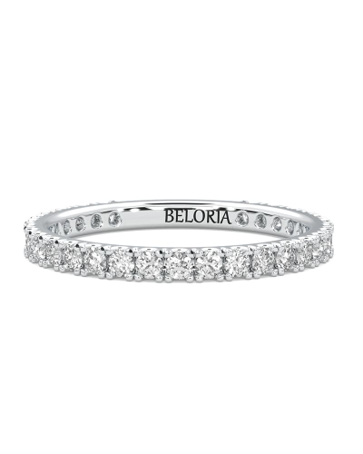 Alliance en or blanc et diamant sertie griffe