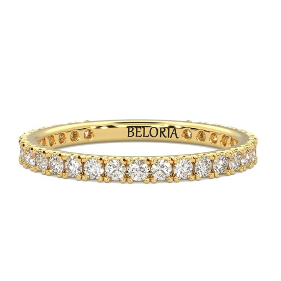 Alliance en or jaune et diamant sertie griffe
