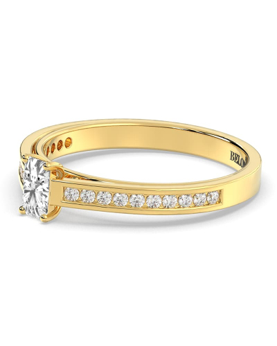Solitaire Accompagné Diamant Emeraude en or jaune