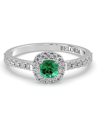 Bague en or blanc 18 carats, émeraude et son halo de diamants