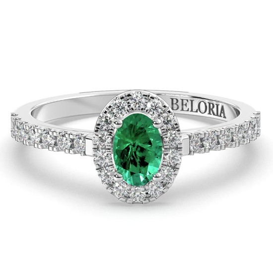 Bague Solitaire en Or blanche émeraude ovale et Halo Accompagné Diamant