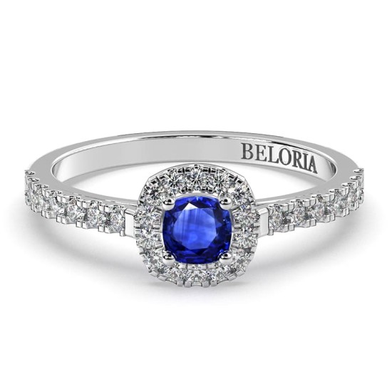 Bague en or blanc 18 carats, saphir et son halo de diamants