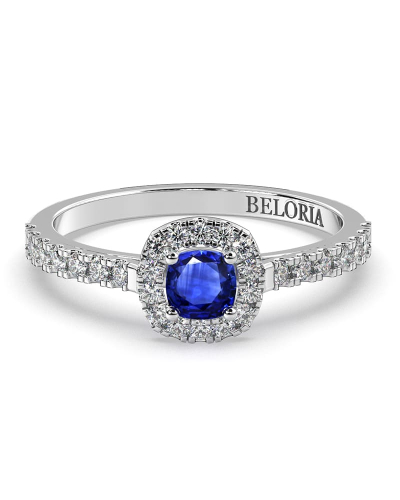 Bague en or blanc 18 carats, saphir et son halo de diamants
