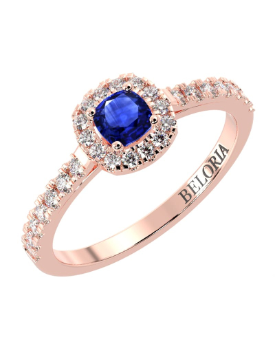 Bague en or rose 18 carats, saphir et son halo de diamants