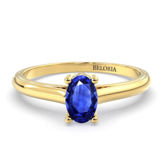 Bague solitaire en or jaune avec saphir ovale