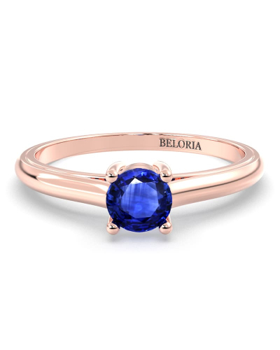 Bague solitaire en or rose avec saphir rond