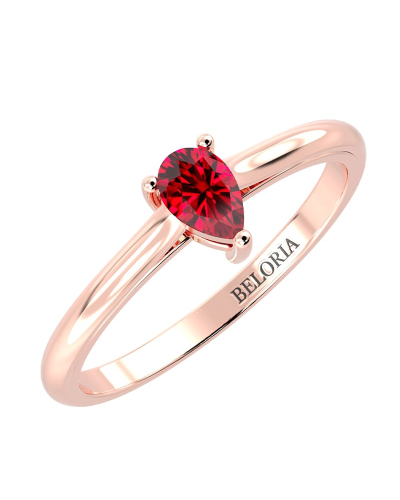 Bague solitaire en or rose avec rubis poire