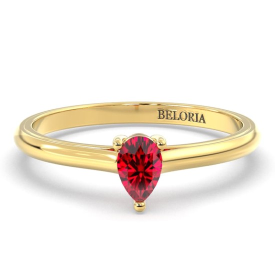 Bague solitaire en or jaune avec rubis poire
