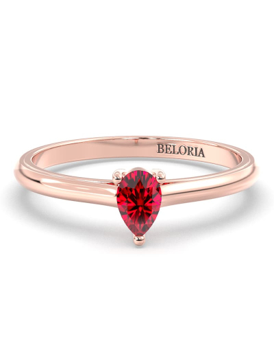 Bague solitaire en or rose avec rubis poire