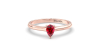 Bague solitaire en or rose avec rubis poire