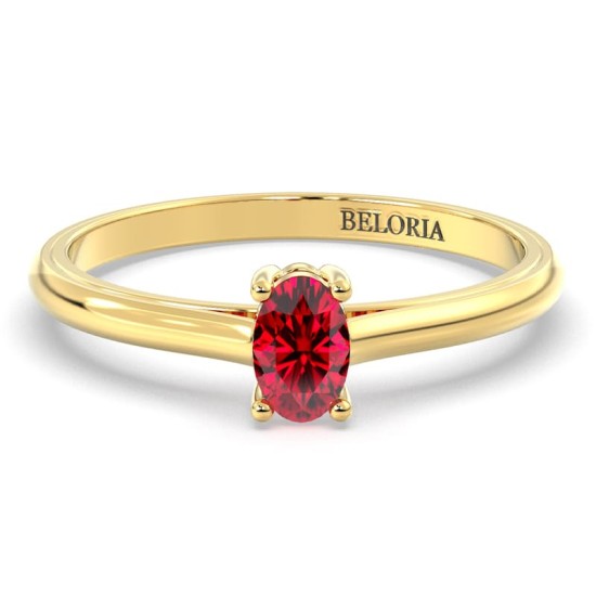 Bague solitaire en or jaune avec rubis ovale