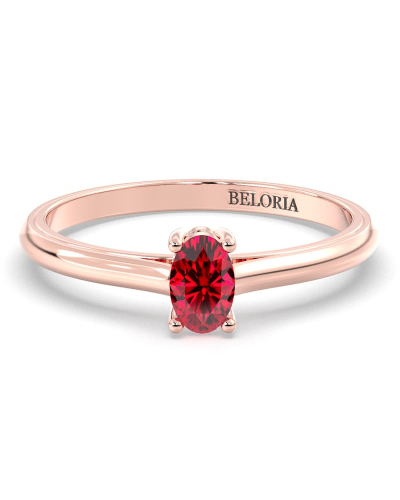 Bague solitaire en or rose avec rubis ovale