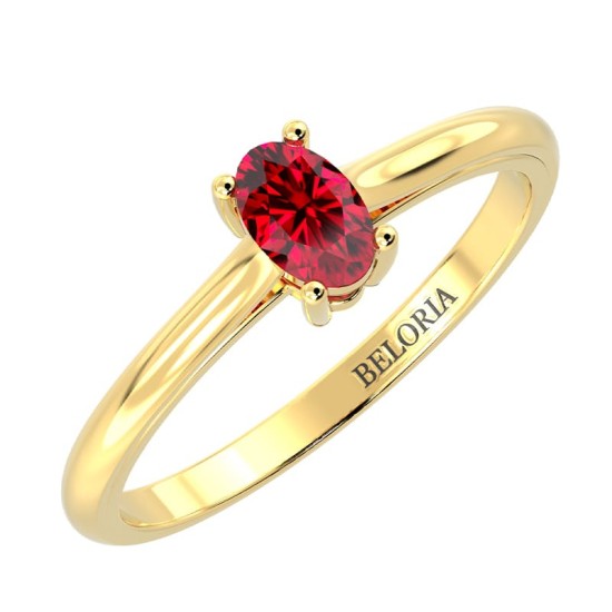 Bague solitaire en or jaune avec rubis ovale