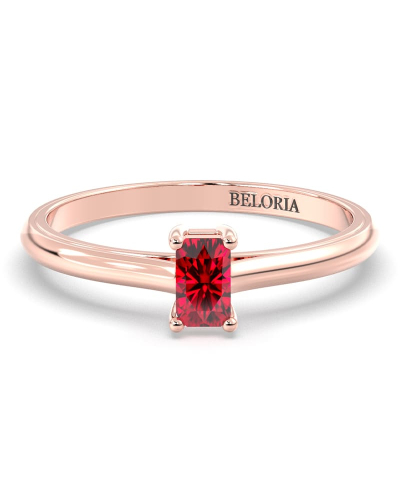 Bague solitaire en or rose avec rubis emeraude